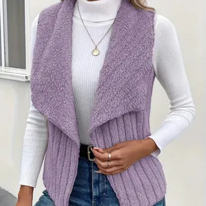 Close-up of a purple sleeveless fleece vest jacket with ribbed texture and open front style