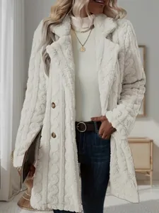 Detail of mid-length white plush coat with cable knit texture and notch lapel