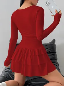 Detailed back view of an elegant red long-sleeved slim-fit tiered ruffle mini dress.