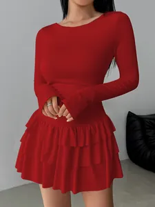 Elegant red long sleeve slim fit dress with tiered ruffled hem detail for women.