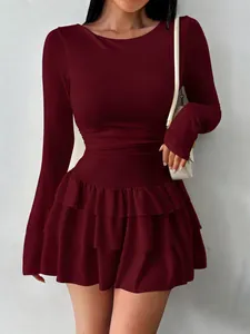 Slim fit long sleeve burgundy tiered ruffle mini dress with pleated waist detail