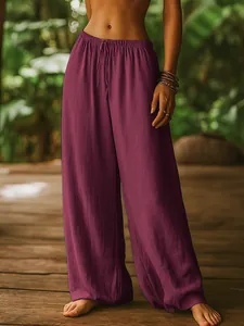 Detail view of purple loose-fit cotton linen wide leg pants with elastic waist