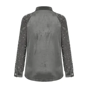Detailed back view of a women's gray velvet long-sleeve shirt featuring silver sequin sleeves.