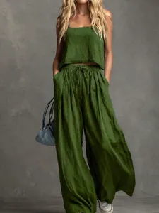Detail of green summer 2-piece set with tank top and linen-textured wide-leg pants