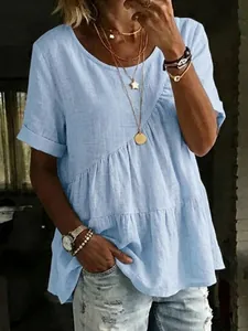 Detailed look at light blue tiered cotton linen tunic top with casual round neck for women