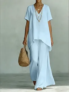 Casual light blue two-piece set with V-neck short sleeve top and wide leg trousers.