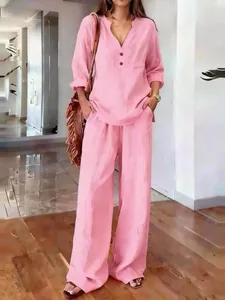 Casual pink two-piece set for women featuring loose long-sleeved top and wide-leg pants