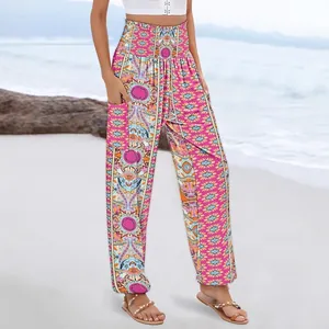 Pantalon sarouel bohème à taille haute élastiquée et poches latérales pour l'été.