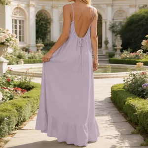 Elegant lilac sleeveless backless maxi dress with spaghetti straps and ruffle hem details