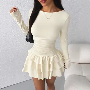 Elegant cream slim-fit long-sleeved mini dress featuring a tiered ruffled cake skirt