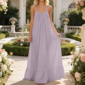 Elegant lavender spaghetti strap maxi dress with ruffled hem in a lush garden