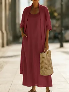 Elegant burgundy cotton linen two-piece set featuring a maxi dress and matching cardigan