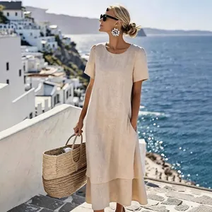 Elegant beige double-layer linen-style midi dress for summer vacation scene.