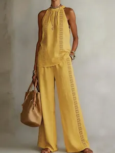Full view detail of mustard yellow linen set with vertical eyelet lace embroidery