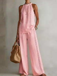 Vintage pink two-piece set featuring lace trim sleeveless top and wide-leg pants