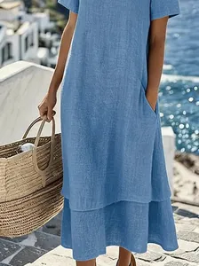 Casual sky blue double-layered summer dress with round neck and short sleeves.