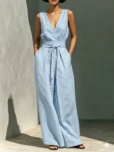 Detailed view of elegant light blue linen sleeveless vest and wide-leg trousers set
