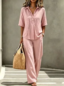Casual roze dames tweedelige set met korte mouwen polo top en wijde pijpen broek