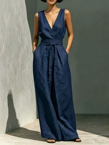 Stylish navy blue sleeveless vest and high-waisted wide-leg pants two-piece set.