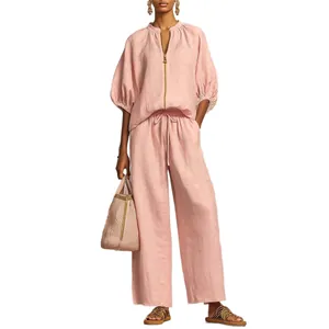 Summer pink casual two-piece linen set for women with puff sleeve zip top and wide-leg trousers