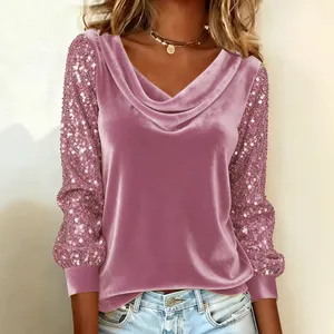Detailed view of pink velvet long sleeve top featuring sparkling sequined sleeves and draped neck