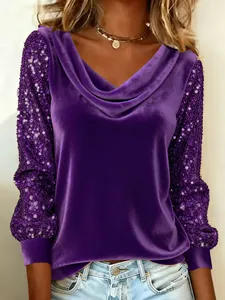 Close-up view of elegant purple velvet cowl neck top with shimmering sequin sleeves.