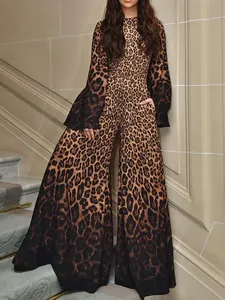 Elegant leopard print jumpsuit featuring long bell sleeves and wide-leg trousers