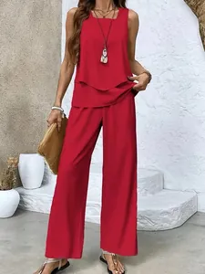 Fashionable red two-piece set featuring a sleeveless double-layer top and wide-leg trousers