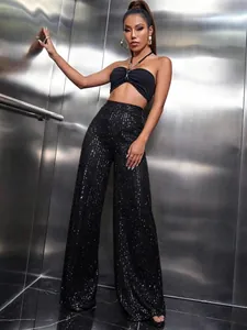 Glamorous black sequin wide-leg pants with high-waisted design for a party look