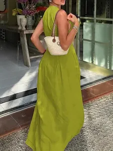Sleeveless lime green high-waisted maxi dress with a slim-fit silhouette