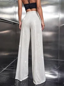 Back view of elegant high-waisted white sequin wide leg trousers for women