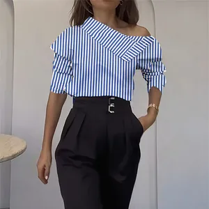 Élégante blouse à manches longues à rayures bleues et blanches dénudée