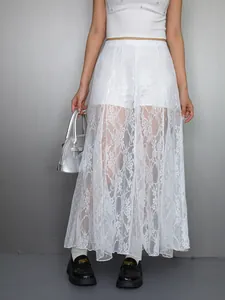 White sheer floral lace maxi skirt with integrated shorts for a trendy look