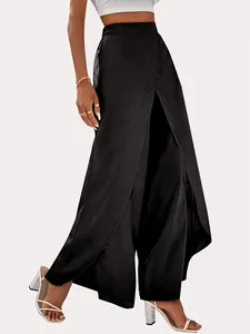Full-length view of high-waisted wide-leg pants with elegant front slit detail.