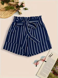 Detailed flat lay of navy blue and white vertical striped casual shorts with a tie waist