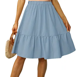 Stylish light blue tiered pleated skirt with elastic waist and ruffled hem for summer