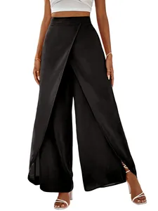 Detail of high-waisted black wide-leg trousers featuring a stylish front wrap design
