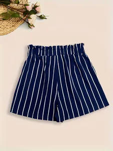 Detailed view of navy blue and white striped shorts with elastic paper-bag waist design
