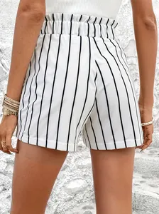 Detailed back view of women's white and black vertical striped high-waisted loose shorts