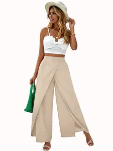 Detail shot of women's beige high-waisted wide-leg pants with elegant wrap front design