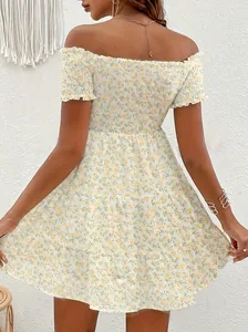 Rear view detail of a floral off-the-shoulder French style dress with smocked bodice