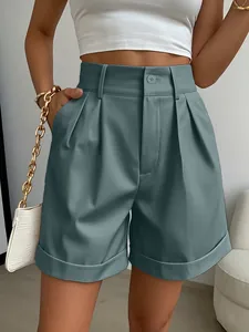 Elegant high-waisted pleated shorts in dusty blue with rolled hem and pockets for summer.