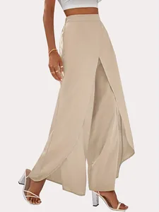High-waisted wide-leg trousers in beige featuring an elegant overlapping slit