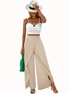 Fashionable woman wearing beige high-waisted wide-leg pants with a unique wrap design