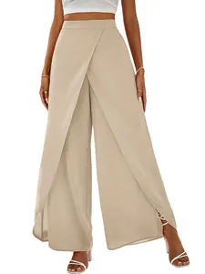 Detail showing the overlapping skirt-pants design of these beige high-waisted wide-leg trousers