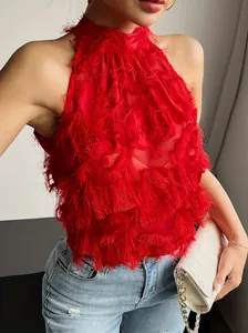Detailed view of elegant red fringe halter top featuring tiered tassels and mesh design