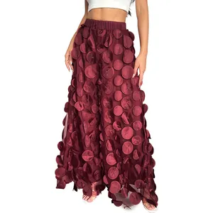 Elegant burgundy wide-leg mesh trousers featuring unique 3D circular dot appliqués