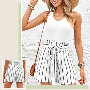 Stylish high-waisted striped shorts with a decorative bow belt and ruffle waist details.