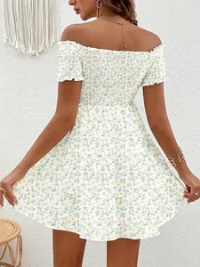 Detailed back view of a white floral off-the-shoulder dress with a tiered skirt design.