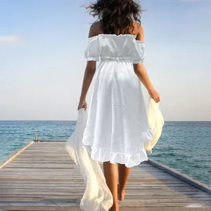 Elegant white off-shoulder maxi dress with ruffled hem and high waist design